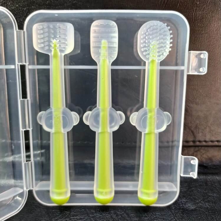 Full Silicone Baby Hand Brush & Teether Set - 3 pcs with Square Box.... Full Silicone Baby Hand Brush & Teether Set - 3 pcs with Square Box - Image 1